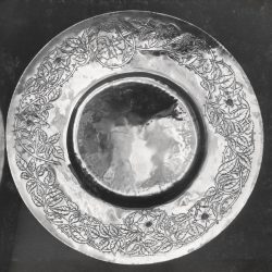 Brass dish with engraved wild rose design